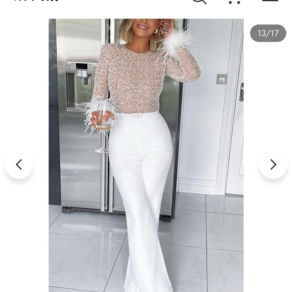 White High-Waist Flared Jumpsuit with Feather Cuff Bodice